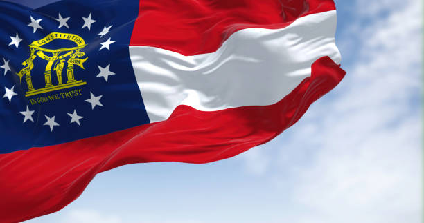 The state flag of Georgia waving in the wind.